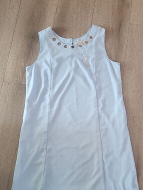 Simply Noelle Light Blue Sleeveless Shift Dress with Grommet Neckline